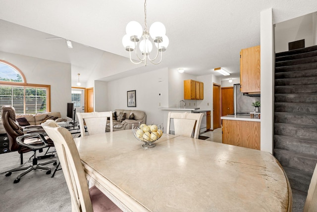 930 106th Ln NW Unit 9Nw, Coon Rapids, MN 55433 - dining area featuring a chandelier and stairs
