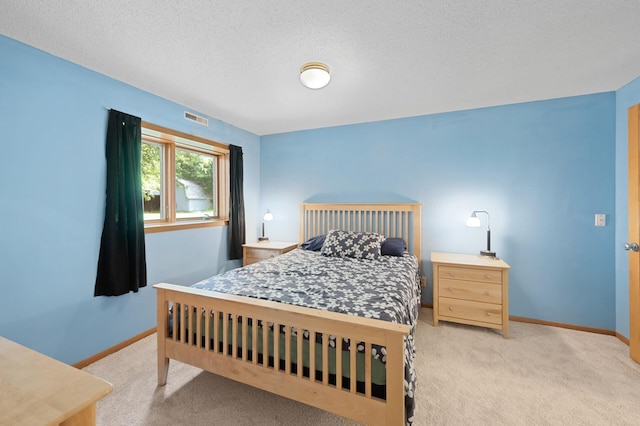 6722 116th Cir, Champlin, MN 55316 - bedroom featuring carpet floors and a textured ceiling