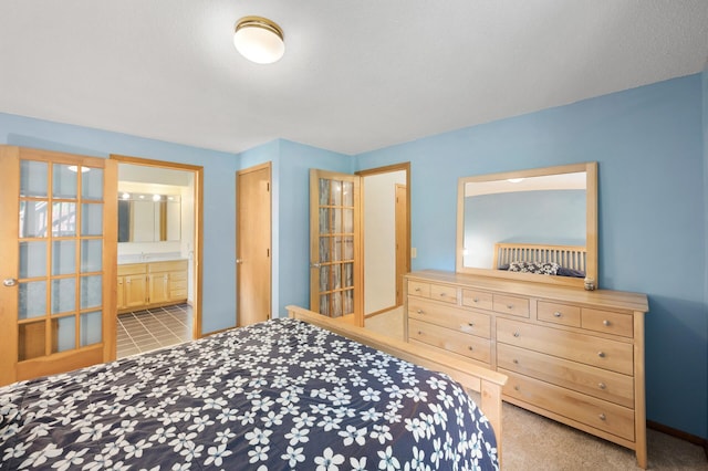 6722 116th Cir, Champlin, MN 55316 - bedroom with a sink and connected bathroom