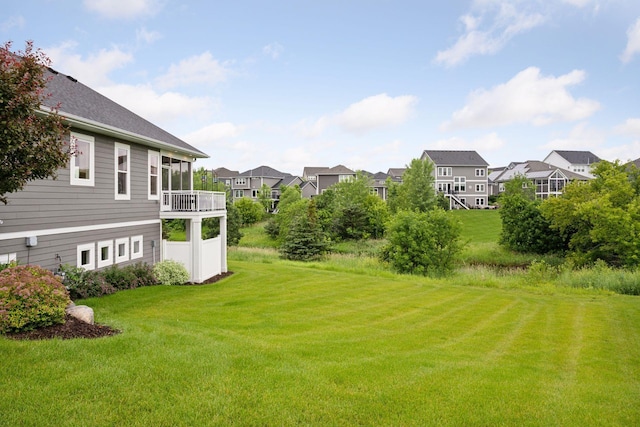 5975 Inland Ln N, Plymouth, MN 55446 - view of grassy yard featuring a residential view