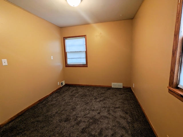 809 16th Ave SE, Austin, MN 55912 - spare room with carpet and baseboards