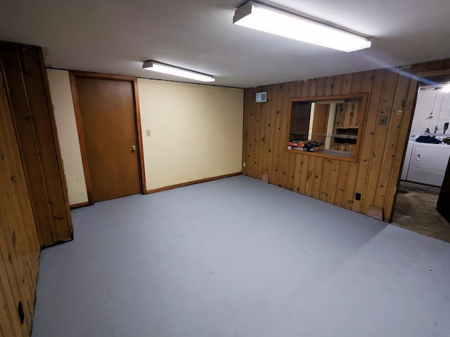 809 16th Ave SE, Austin, MN 55912 - finished below grade area featuring wood walls and washer and dryer