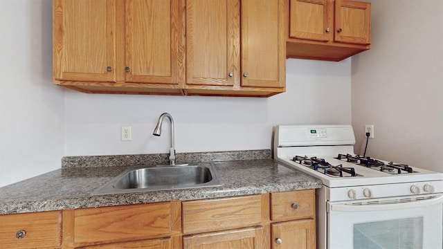 1038 23rd Ave SE, Minneapolis, MN 55414 - kitchen with gas range gas stove and a sink