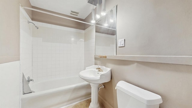 1038 23rd Ave SE, Minneapolis, MN 55414 - bathroom featuring  shower combination and tile patterned flooring