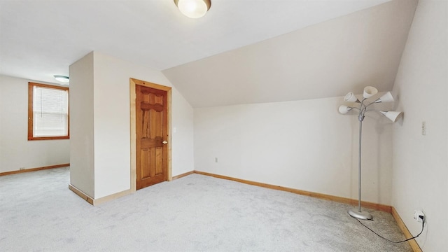 1038 23rd Ave SE, Minneapolis, MN 55414 - additional living space with carpet floors and vaulted ceiling