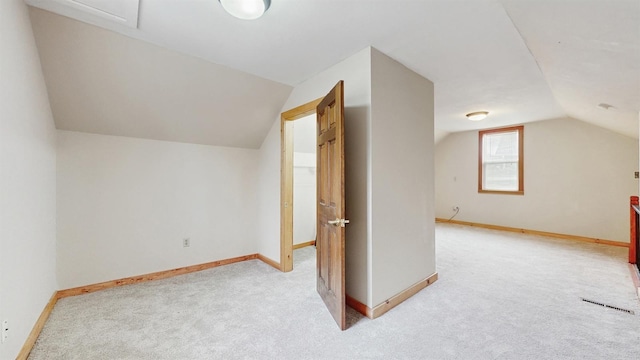 1038 23rd Ave SE, Minneapolis, MN 55414 - additional living space with lofted ceiling and light carpet