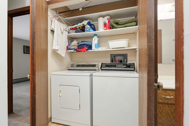 1903 Silver Bell Rd Unit 108, Eagan, MN 55122 - laundry room with washer and dryer and a baseboard radiator