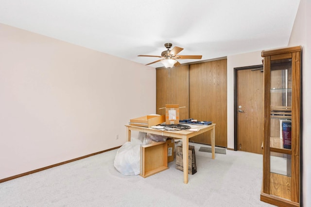 1887 Silver Bell Rd Unit 115, Eagan, MN 55122 - dining space with ceiling fan, light colored carpet, and a desk