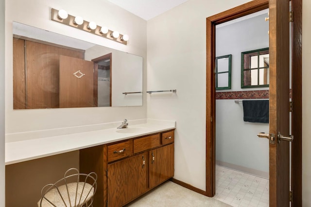 1887 Silver Bell Rd Unit 115, Eagan, MN 55122 - bathroom featuring vanity and tile patterned floors