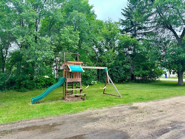 316 2nd St NE, Menahga, MN 56464 - view of play area featuring a yard