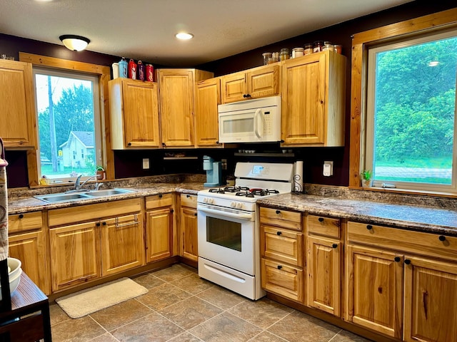316 2nd St NE, Menahga, MN 56464 - kitchen featuring white appliances and recessed lighting