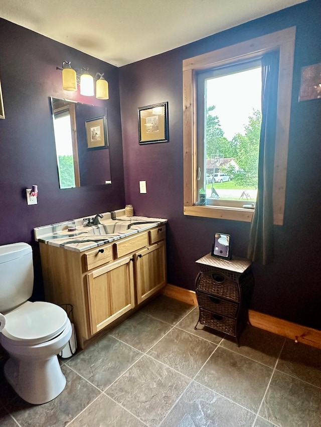 316 2nd St NE, Menahga, MN 56464 - bathroom with vanity and tile patterned flooring