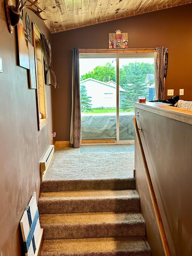 316 2nd St NE, Menahga, MN 56464 - stairs featuring baseboard heating and wooden ceiling