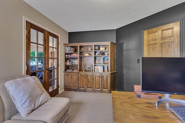 2668 Waterford Ct, Saint Cloud, MN 56301 - office featuring french doors, a textured ceiling, and carpet