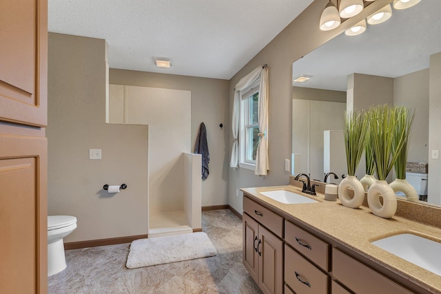 2668 Waterford Ct, Saint Cloud, MN 56301 - bathroom with double vanity, a shower, and tile patterned floors