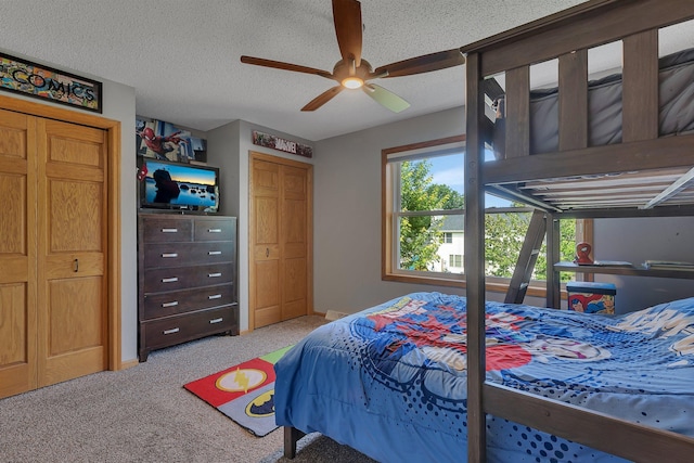 2668 Waterford Ct, Saint Cloud, MN 56301 - bedroom with light colored carpet, a ceiling fan, and a textured ceiling