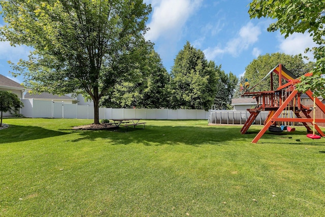 2668 Waterford Ct, Saint Cloud, MN 56301 - fenced backyard featuring a playground