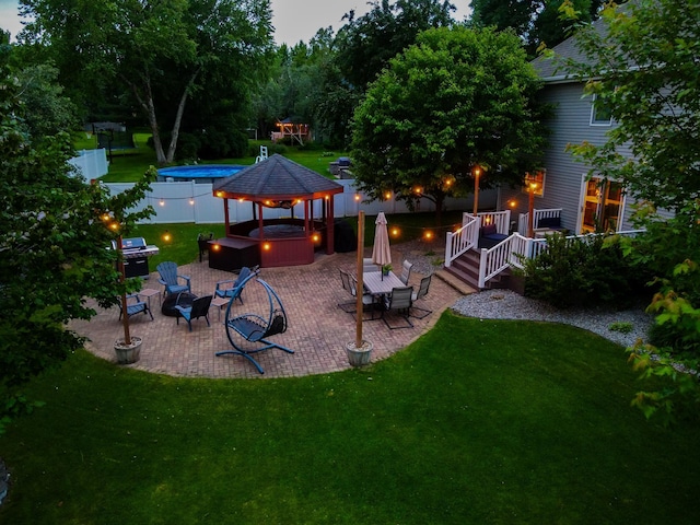 2668 Waterford Ct, Saint Cloud, MN 56301 - view of yard with a hot tub, a gazebo, and a patio
