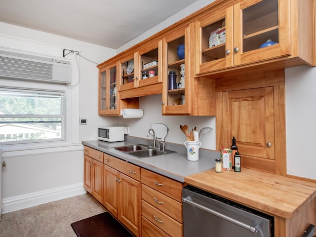 63 Avon St S Unit 36, Saint Paul, MN 55105 - kitchen featuring dishwasher, white microwave, glass insert cabinets, a wall mounted AC, and brown cabinetry
