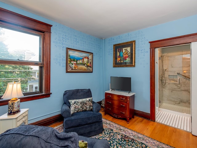 63 Avon St S Unit 36, Saint Paul, MN 55105 - living area with baseboard heating and wood finished floors