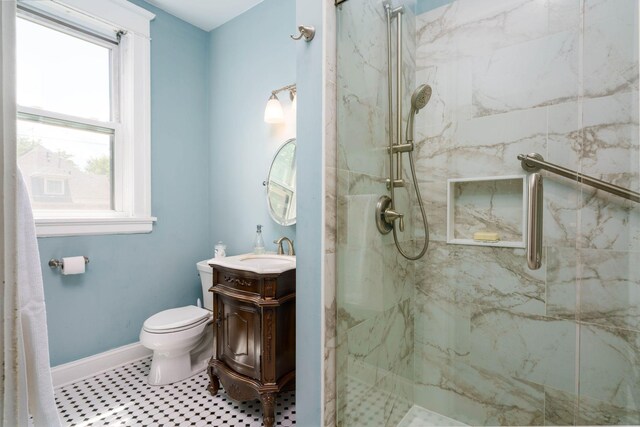 63 Avon St S Unit 36, Saint Paul, MN 55105 - bathroom with plenty of natural light, a marble finish shower, and vanity