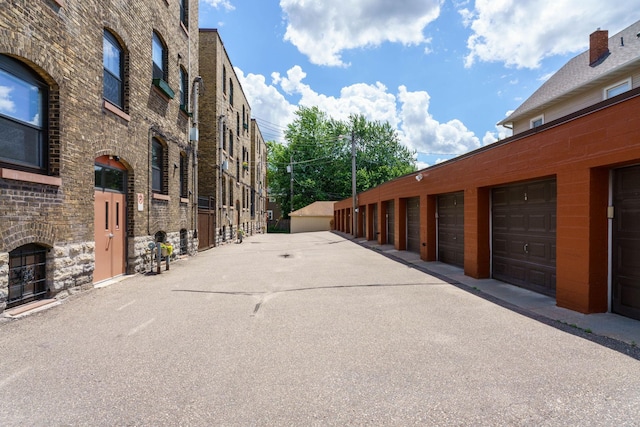 63 Avon St S Unit 36, Saint Paul, MN 55105 - view of asphalt alley with community garages