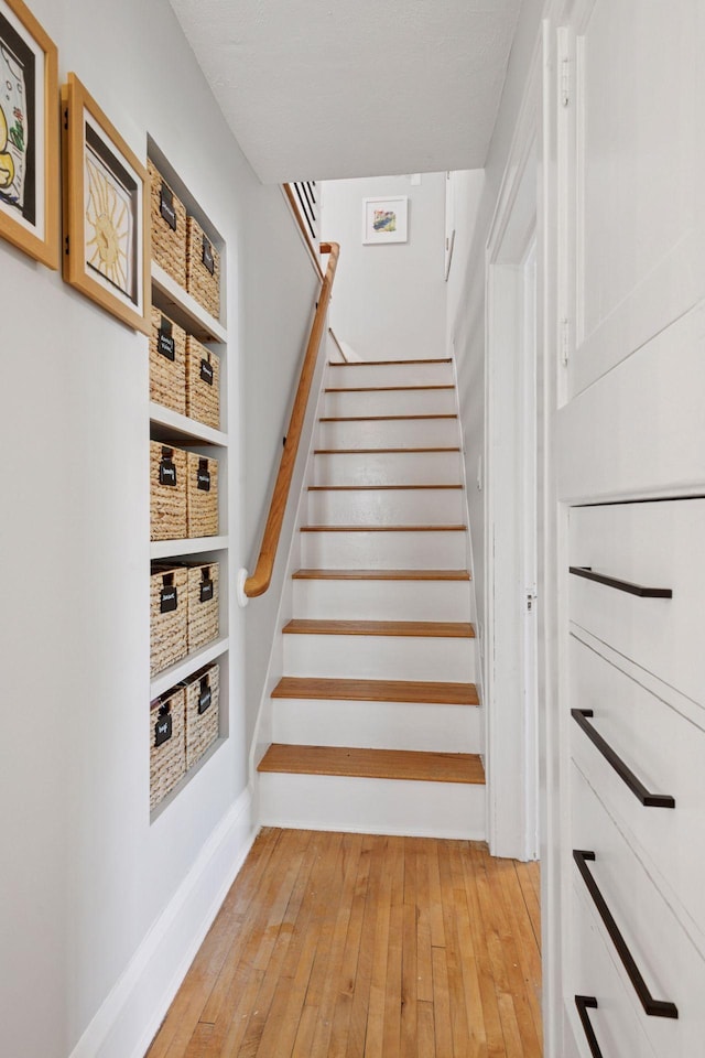 4708 Pleasant Ave, Minneapolis, MN 55419 - stairway featuring hardwood / wood-style flooring and baseboards