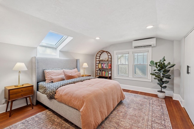 4708 Pleasant Ave, Minneapolis, MN 55419 - bedroom featuring an AC wall unit, a skylight, lofted ceiling, wood finished floors, and recessed lighting