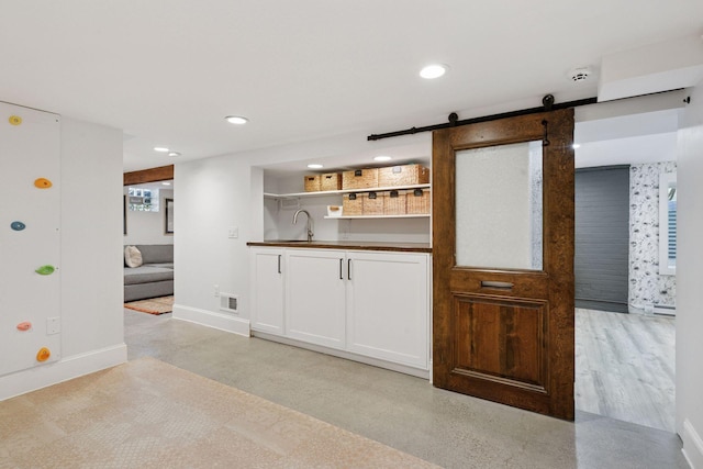 4708 Pleasant Ave, Minneapolis, MN 55419 - bar area featuring recessed lighting and a barn door