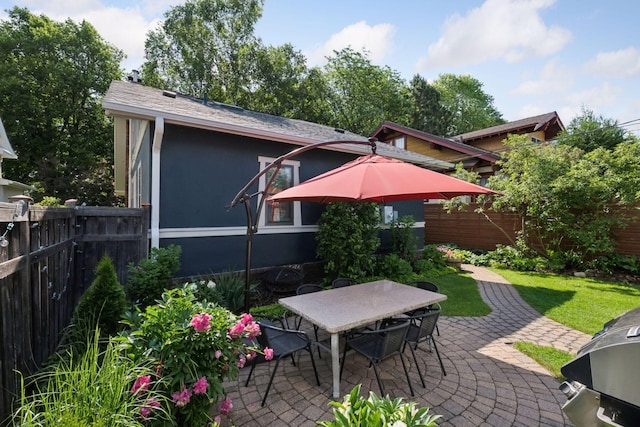 4708 Pleasant Ave, Minneapolis, MN 55419 - fenced backyard with a patio area, outdoor dining area, and a grill