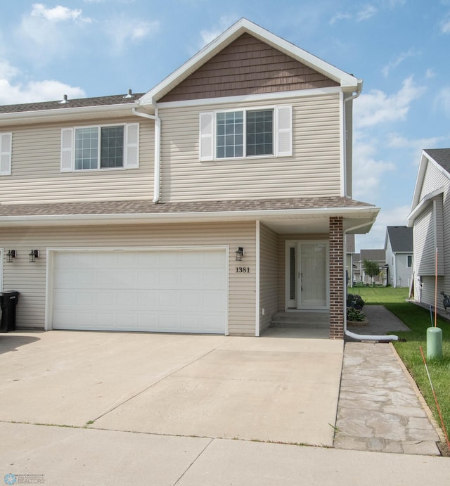 1381 Westport Beach Way W, Fargo, ND 58078 - view of front of home featuring a garage and concrete driveway