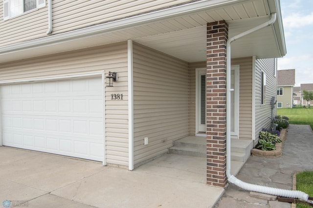 1381 Westport Beach Way W, Fargo, ND 58078 - view of exterior entry featuring a garage