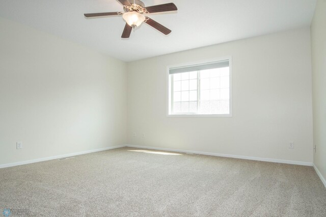 1381 Westport Beach Way W, Fargo, ND 58078 - unfurnished room featuring carpet and ceiling fan