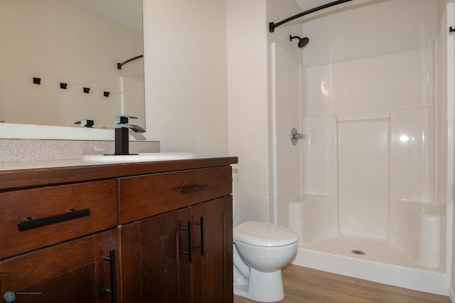 1381 Westport Beach Way W, Fargo, ND 58078 - full bathroom featuring vanity, a shower, and wood finished floors