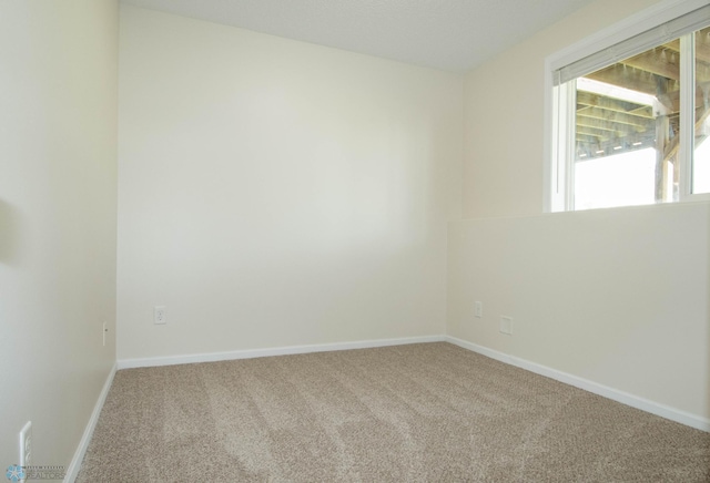 1381 Westport Beach Way W, Fargo, ND 58078 - spare room with carpet flooring and baseboards