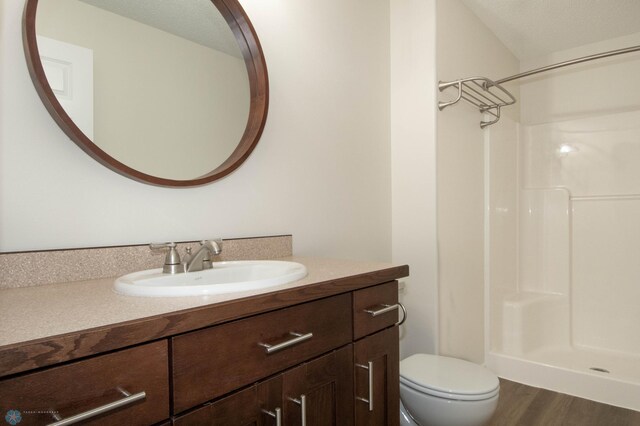 1381 Westport Beach Way W, Fargo, ND 58078 - full bath with vanity, a shower, and wood finished floors
