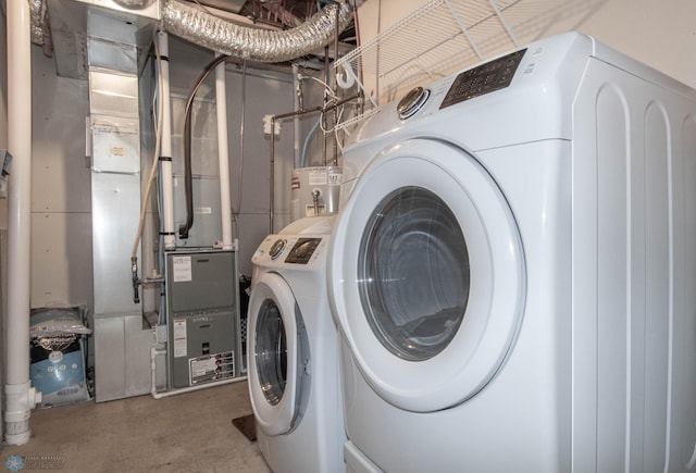 1381 Westport Beach Way W, Fargo, ND 58078 - laundry room with separate washer and dryer, heating unit, and water heater