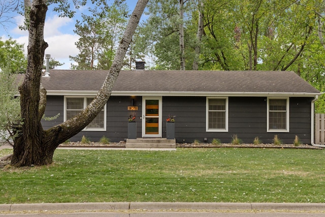 18201 Kathleene Dr, Minnetonka, MN 55345 - view of front of property with a front lawn, a chimney, and entry steps