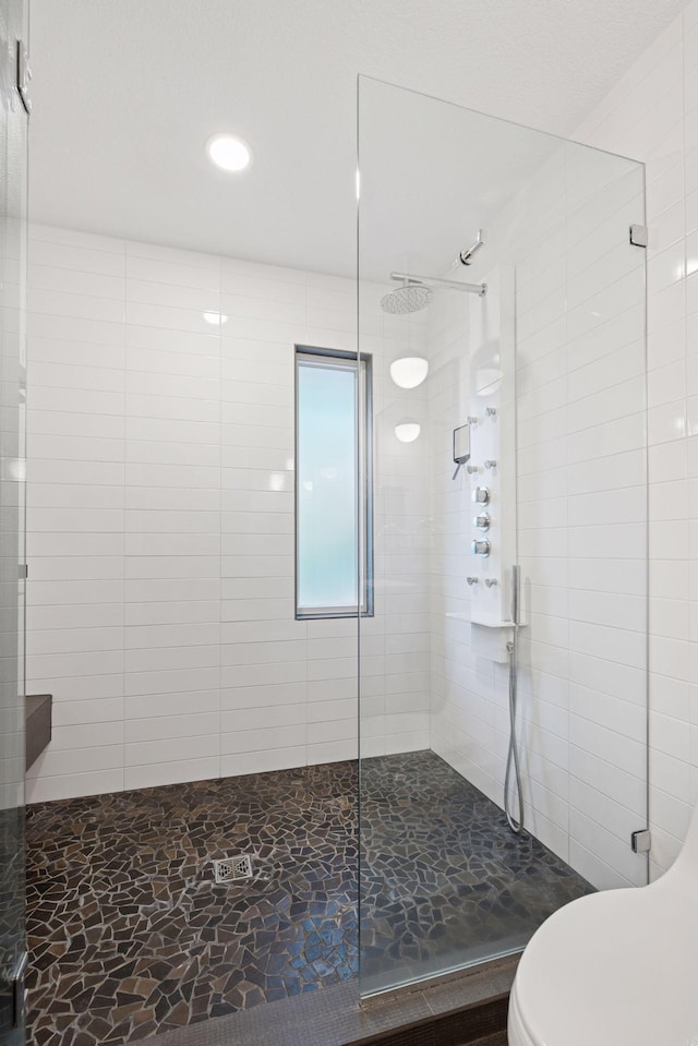18201 Kathleene Dr, Minnetonka, MN 55345 - bathroom with a shower stall and recessed lighting