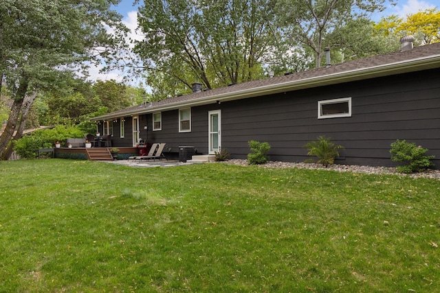 18201 Kathleene Dr, Minnetonka, MN 55345 - rear view of house with a deck, a yard, and a patio area