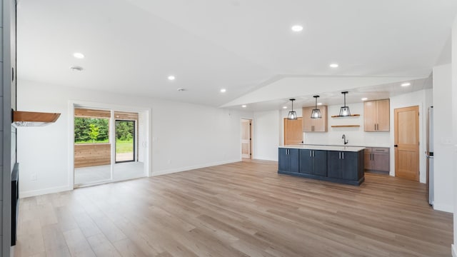322 Old Glory Dr NE, Alexandria, MN 56308 - unfurnished living room with light wood-type flooring, vaulted ceiling, and recessed lighting