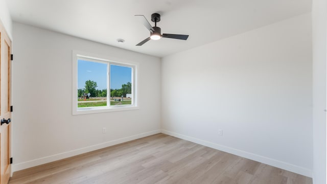 322 Old Glory Dr NE, Alexandria, MN 56308 - empty room featuring light wood-style floors, ceiling fan, and a smoke detector