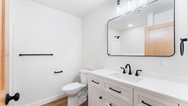 322 Old Glory Dr NE, Alexandria, MN 56308 - bathroom with vanity, wood finished floors, and a shower