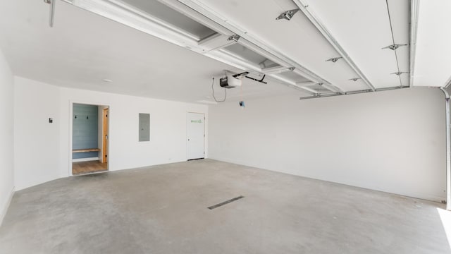 322 Old Glory Dr NE, Alexandria, MN 56308 - garage featuring a garage door opener and electric panel