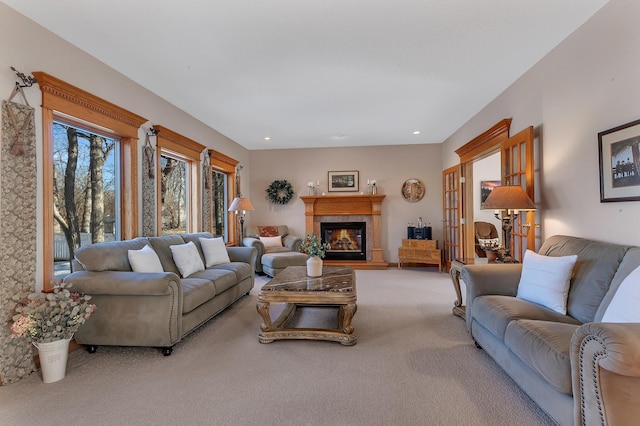 617 17th St N, Sartell, MN 56377 - living room featuring carpet, a glass covered fireplace, and recessed lighting
