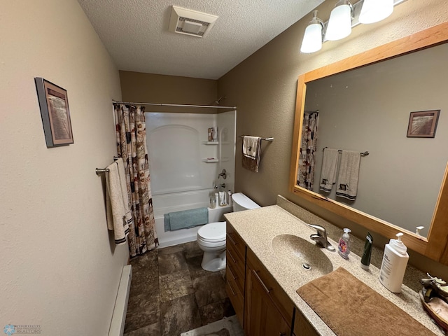 238 18th St E, West Fargo, ND 58078 - full bath with a textured ceiling, vanity, shower / bath combination with curtain, stone finish floors, and a baseboard heating unit