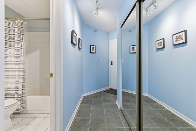 3131 Excelsior Blvd Unit 508, Minneapolis, MN 55416 - hall with track lighting and tile patterned flooring