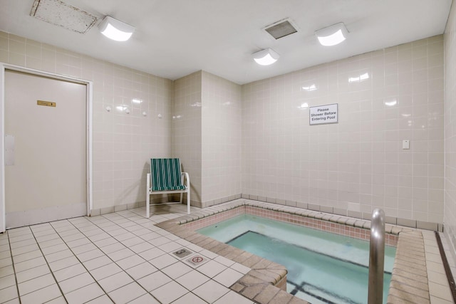 3131 Excelsior Blvd Unit 508, Minneapolis, MN 55416 - view of swimming pool featuring an in-ground hot tub