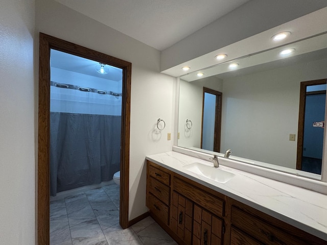 605 Arbor Ct, Marshall, MN 56258 - full bathroom with marble look tile flooring, vanity, recessed lighting, and a shower with curtain