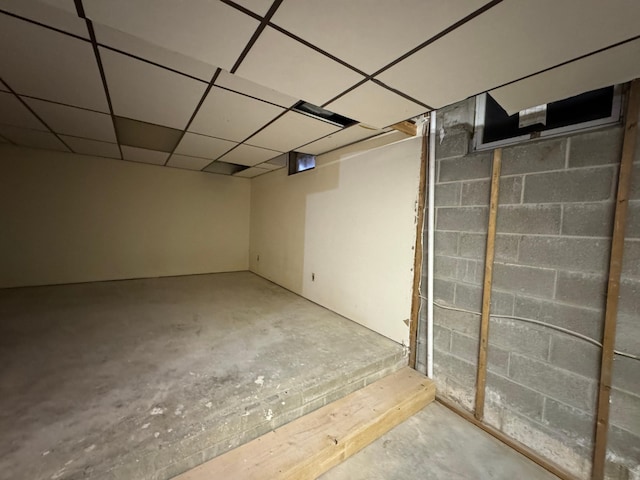 605 Arbor Ct, Marshall, MN 56258 - unfinished basement with a paneled ceiling and concrete block wall
